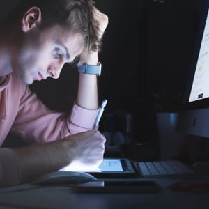 man at nighttime with blue light effecting circadian system