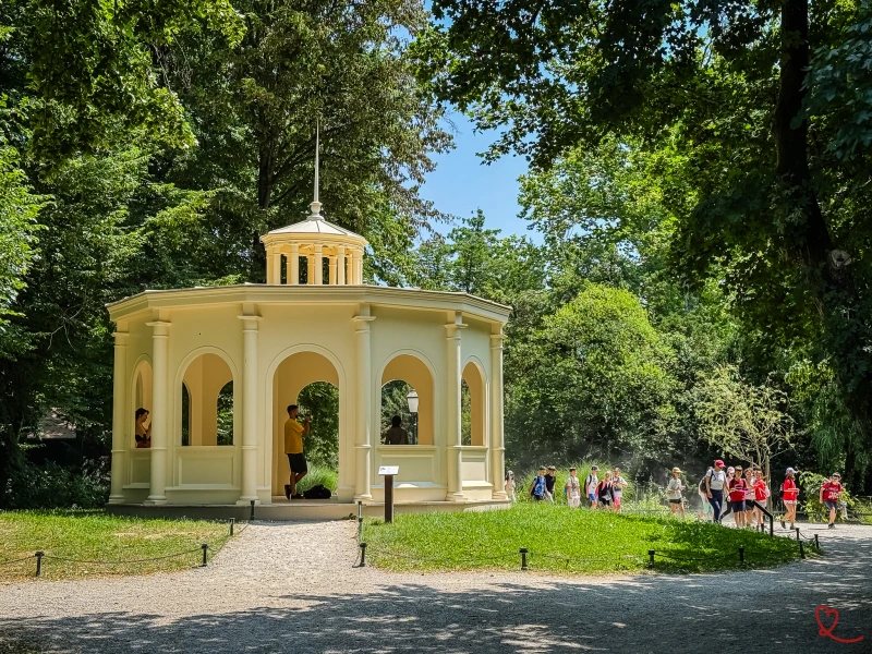 Jeka Pavilion with visitors walking on a path in Maksimir Park
