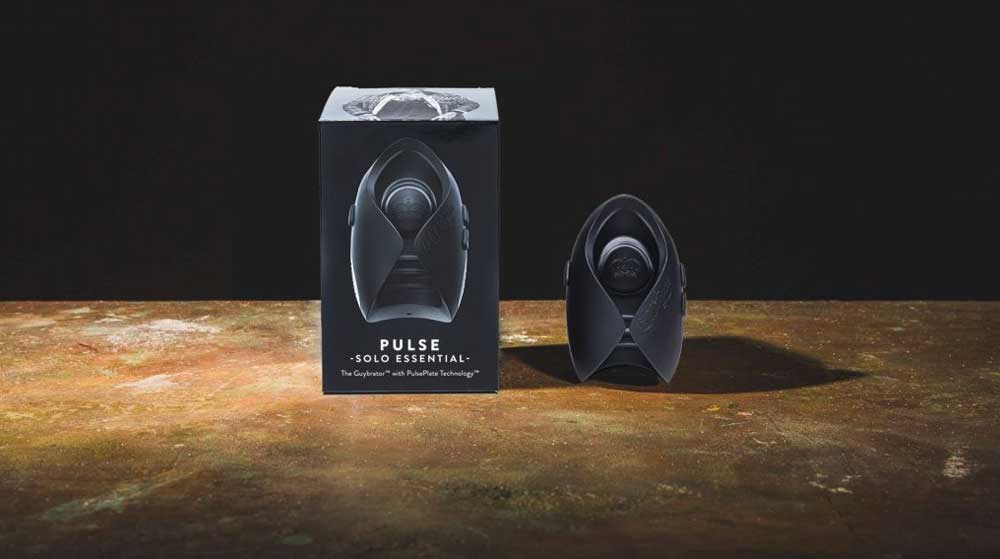 pulse solo essential beside its packaging on a brown table