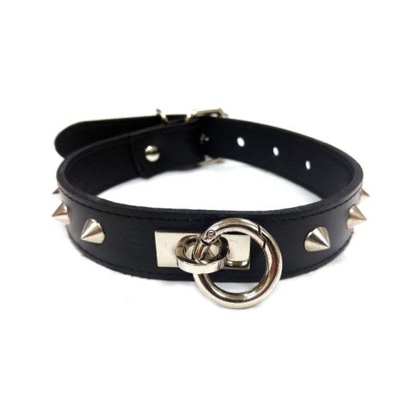 a black leather collar with a metal ring and studs on it