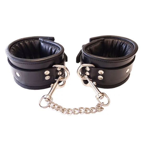 Black leather padded wrist cuffs against a white background