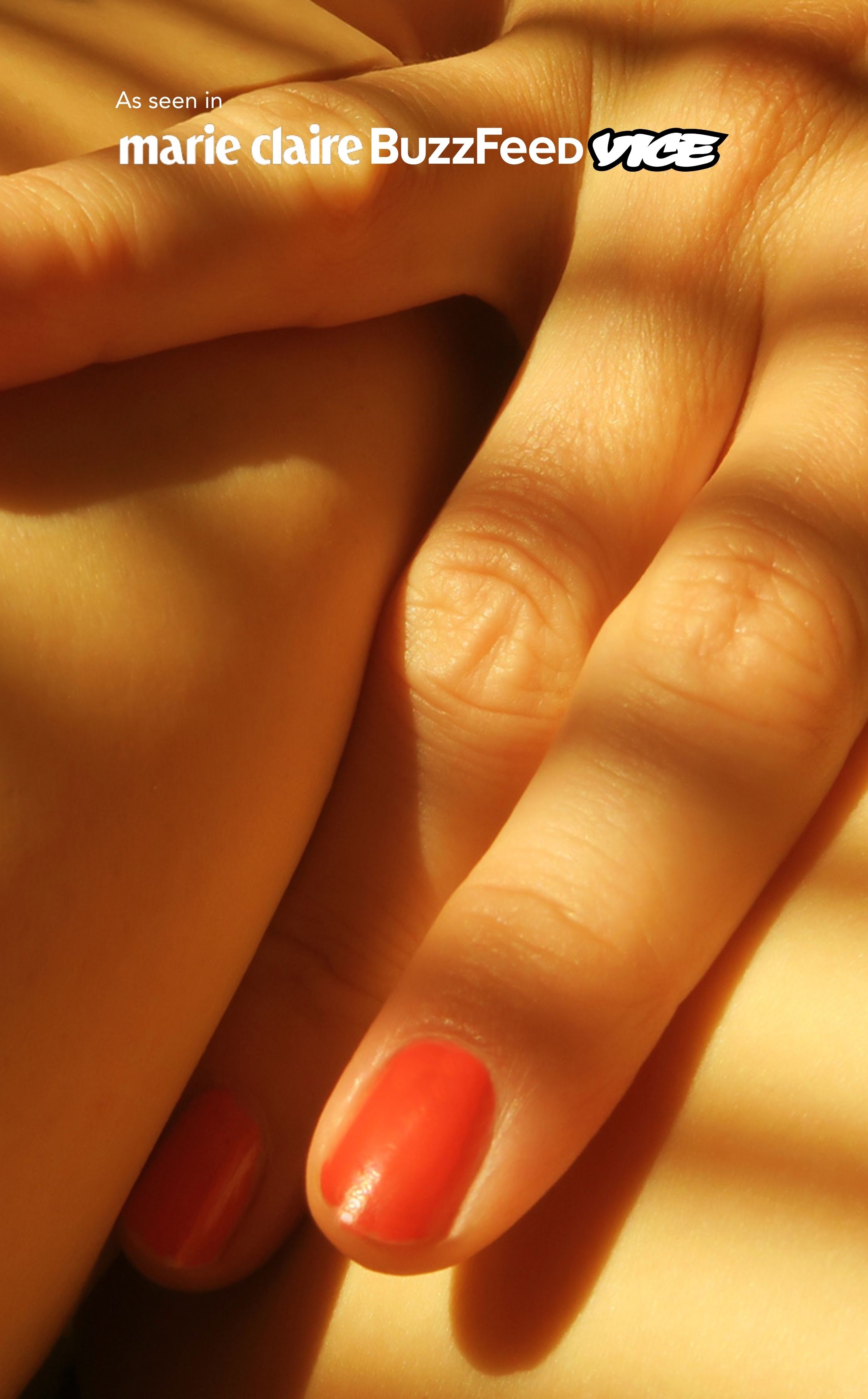 image of a female hand with painted nails suggestively posed as if she's playing with herself