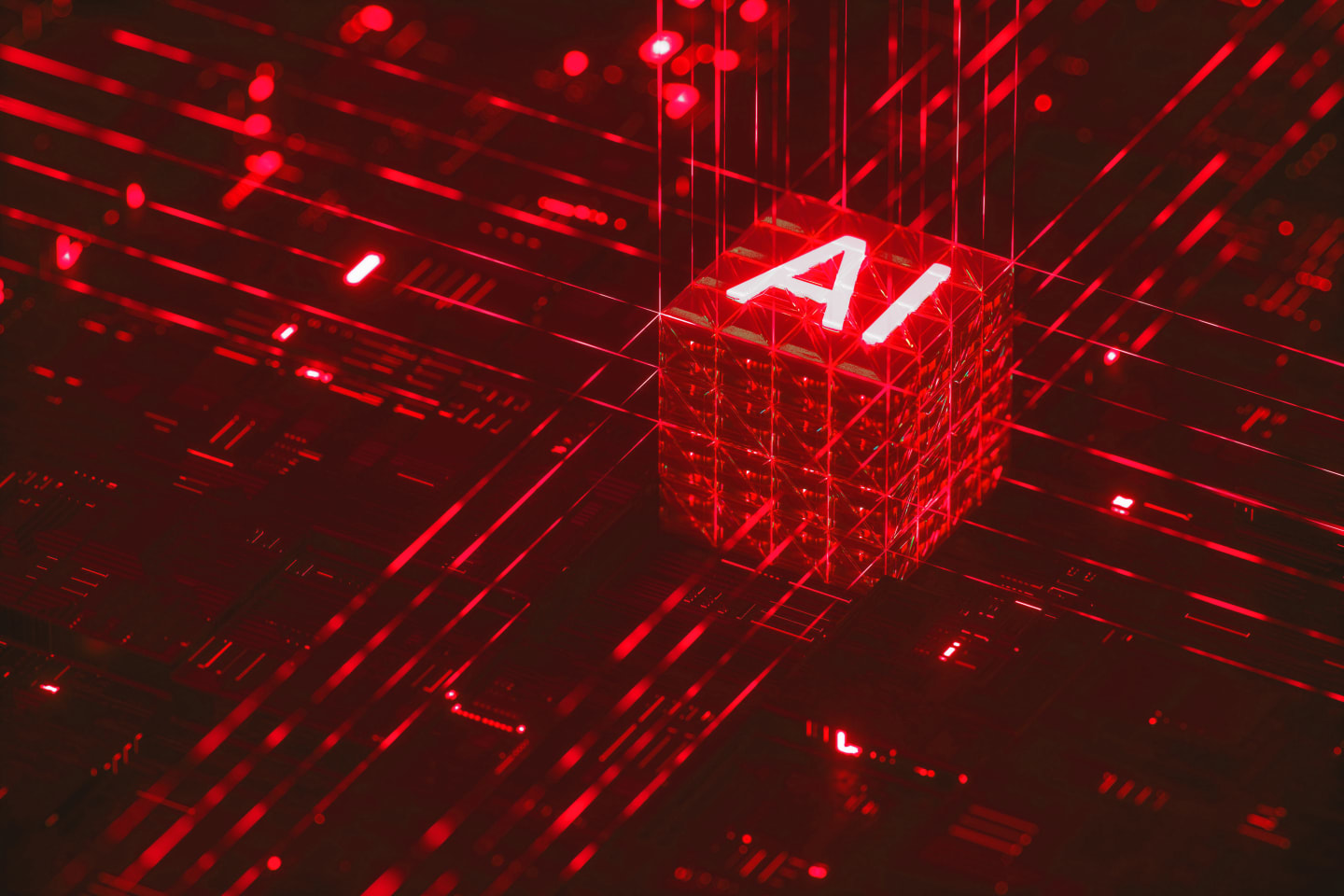 Rendering astratto di un cubo con la scritta AI illuminato di rosso su un circuito digitale