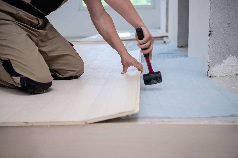 Worker Installing Laminate
