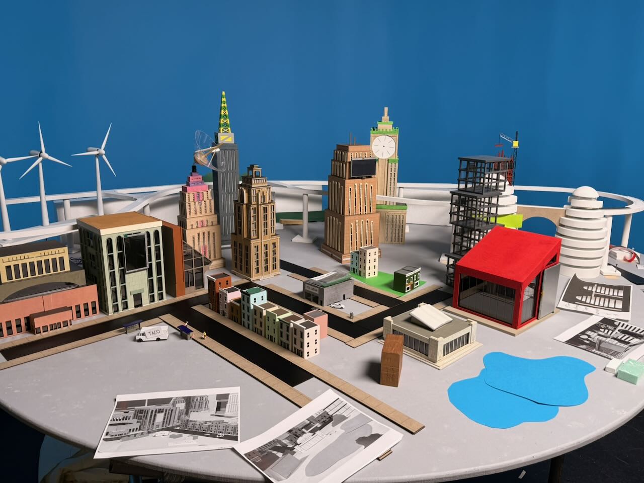 The Stripe City model on set, buildings and miniature details visible against a blue chroma key background