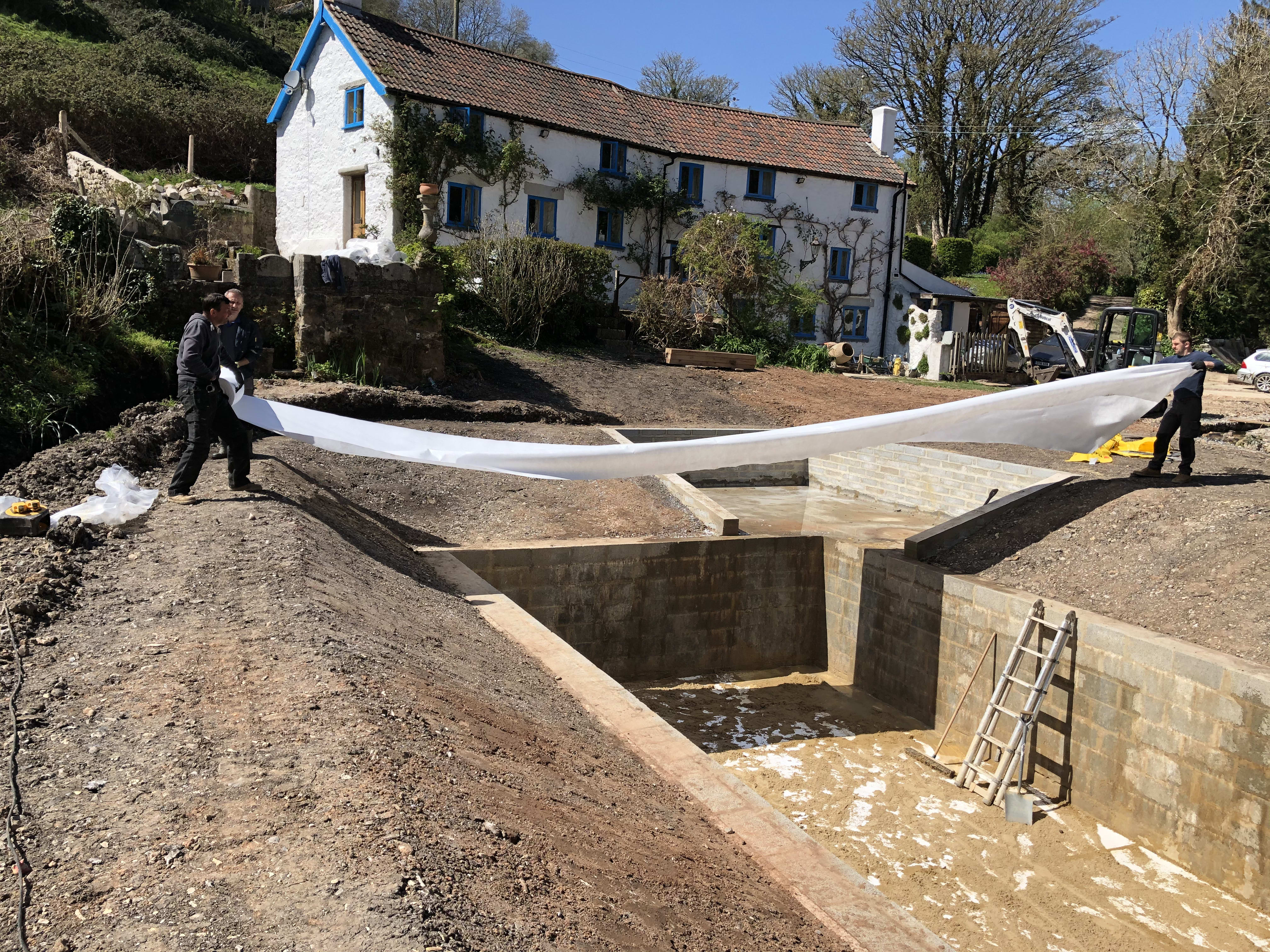 Lining the pond — building the organic swimming pond at Hole Mill, Branscombe, Devon — photo 1 of 10