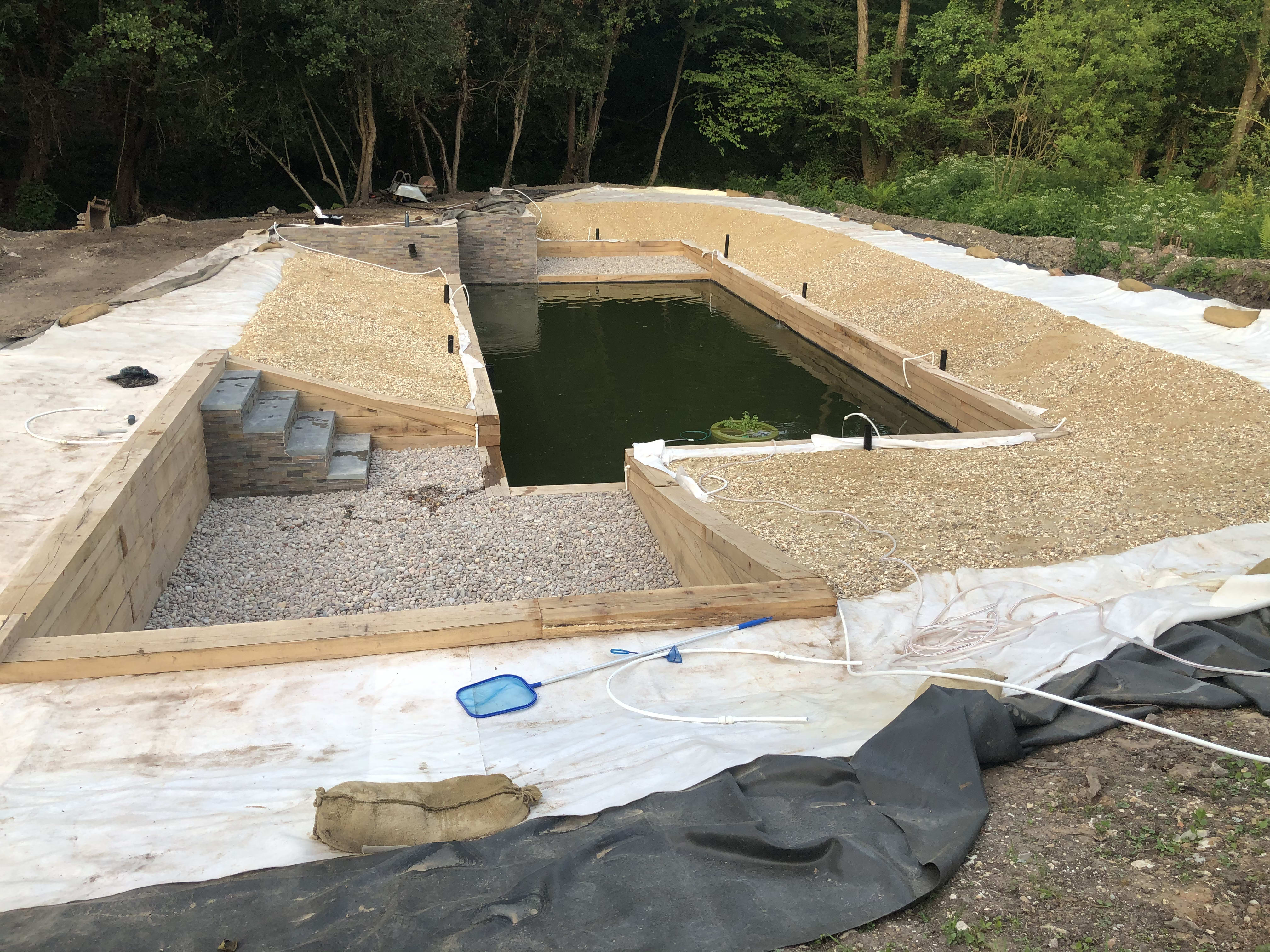 Filling and planting — building the organic swimming pond at Hole Mill, Branscombe, Devon — photo 3 of 6