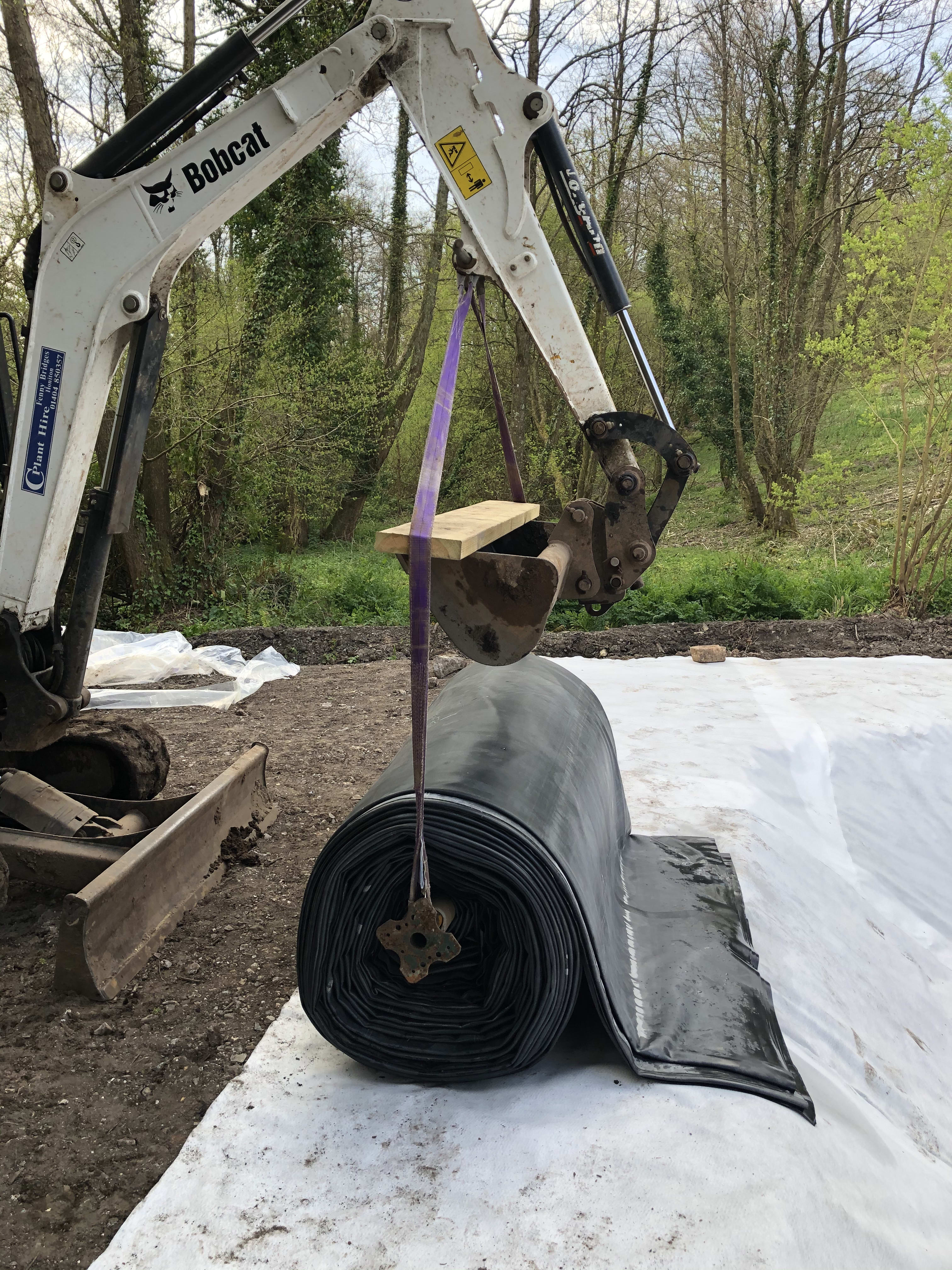 Lining the pond — building the organic swimming pond at Hole Mill, Branscombe, Devon — photo 8 of 10