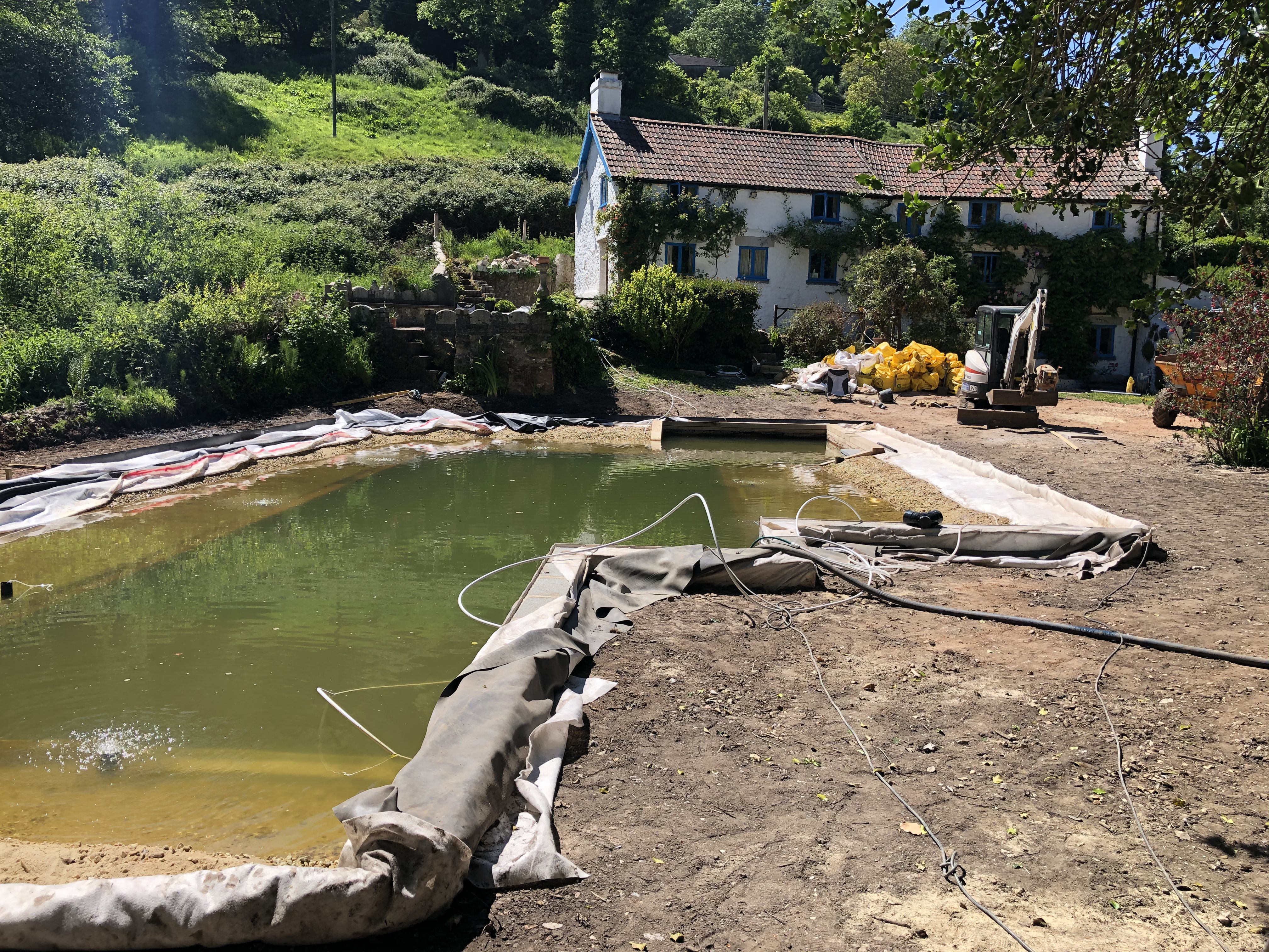 Filling and planting — building the organic swimming pond at Hole Mill, Branscombe, Devon — photo 2 of 6