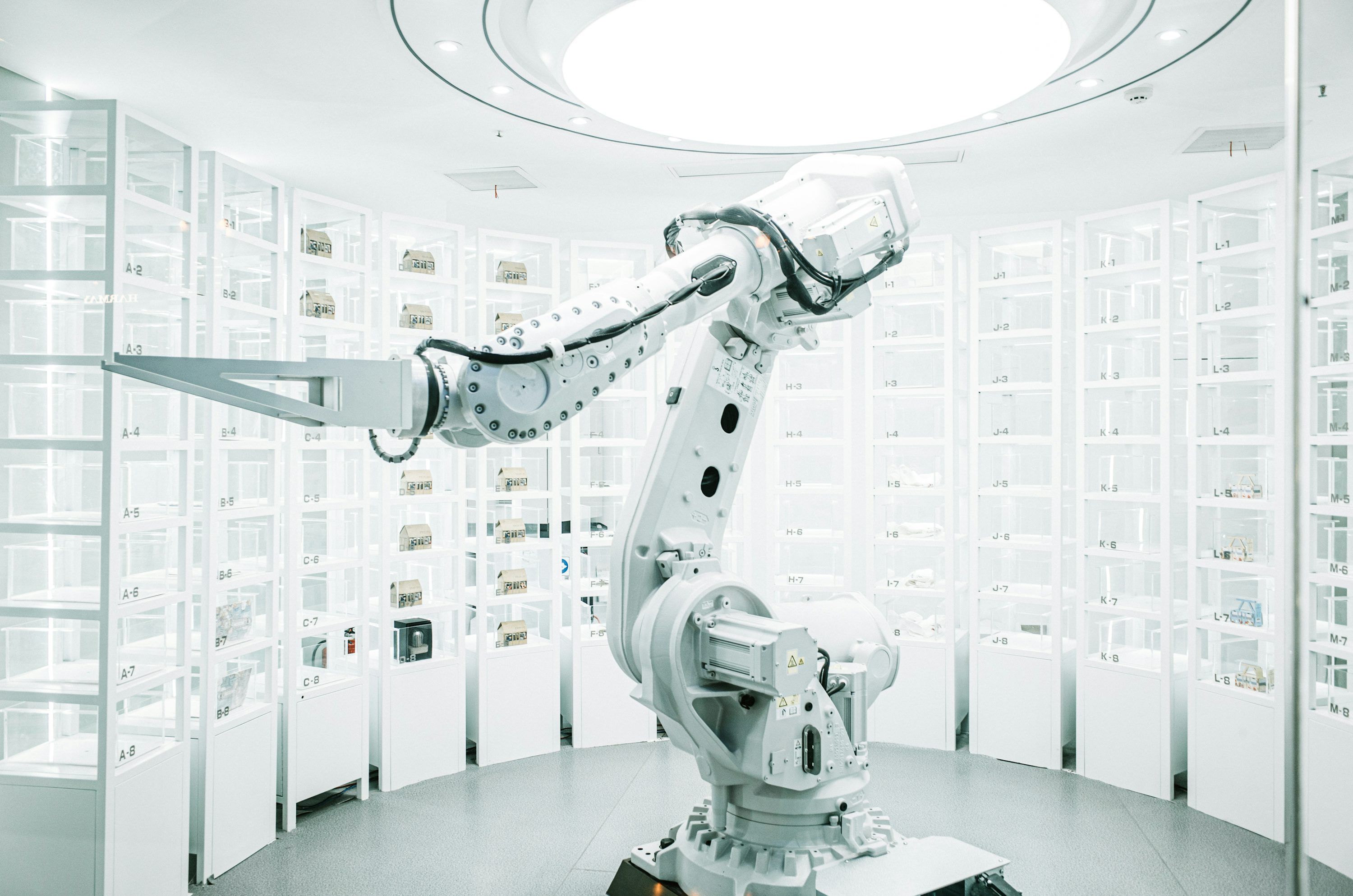 Automated warehouse with robotic machinery processing inventory, representing AI-driven retail operations