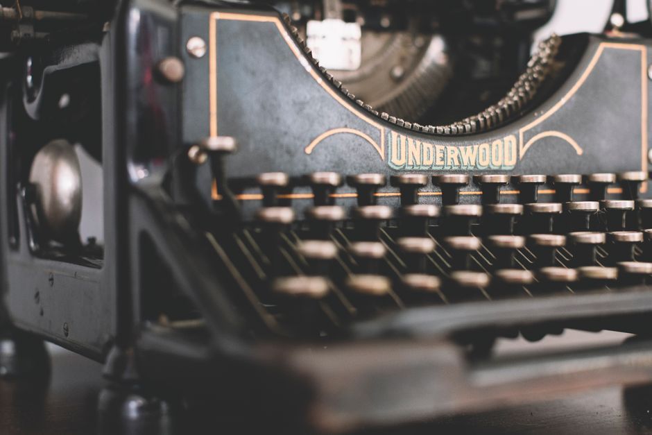 Detailed image of an antique Underwood typewriter with emphasis on keys.