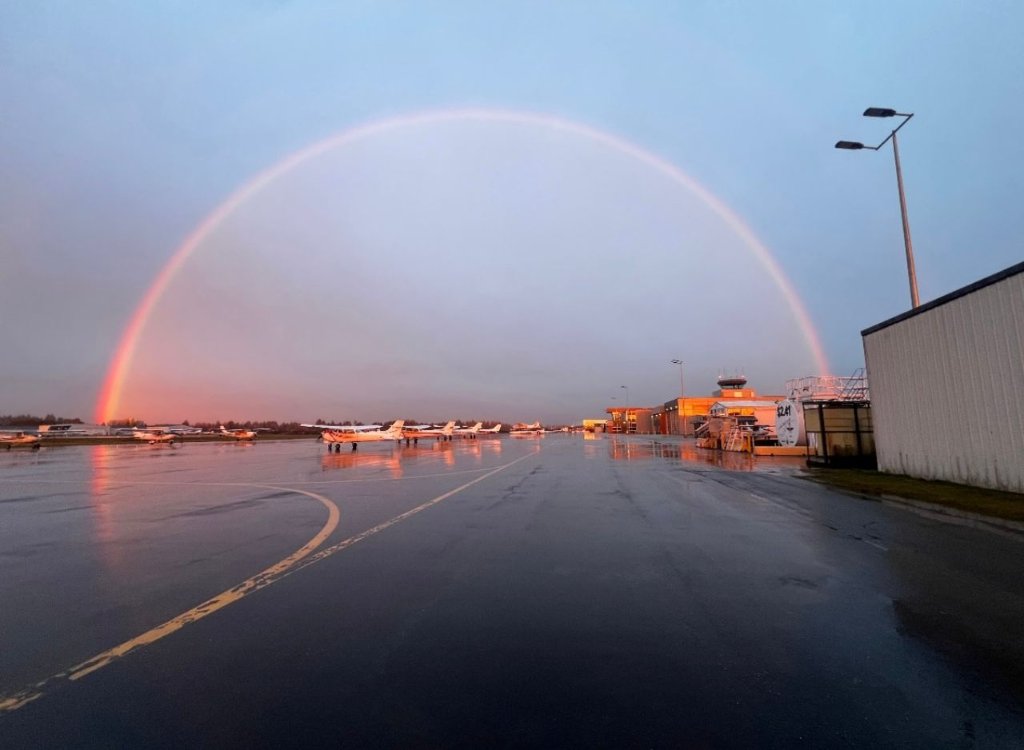 Aircraft on runway at sunrise