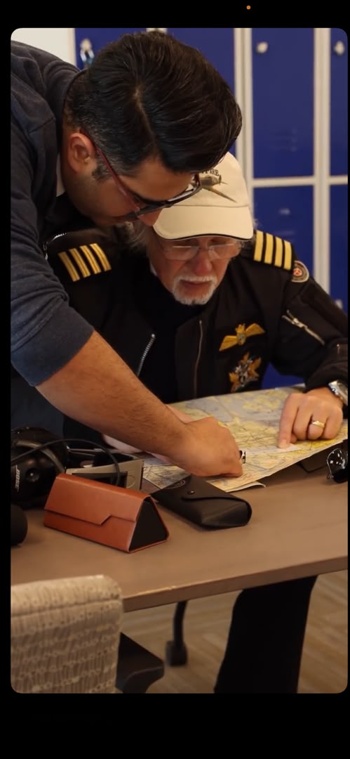 Student pilot walking from dispatch toward a training aircraft