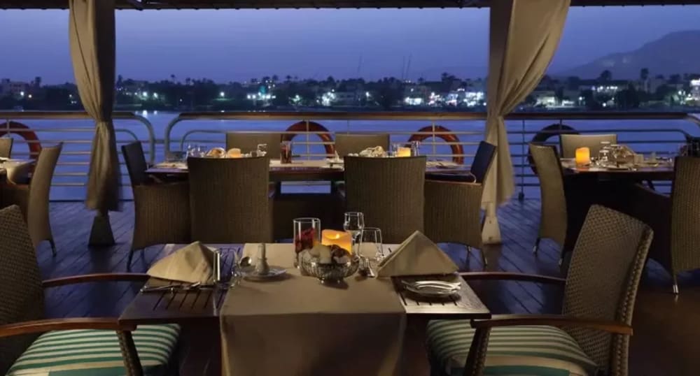 MS Acamar Nile Cruise sun deck with shaded loungers overlooking the tranquil Nile