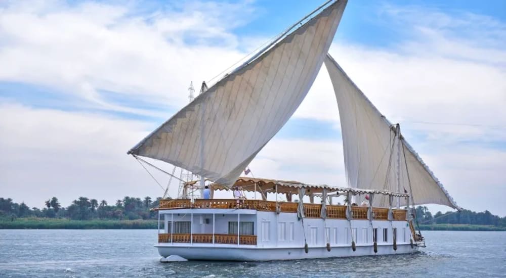 Traditional Dahabiya Sailing on the Nile River