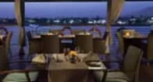 MS Acamar Nile Cruise sun deck with shaded loungers overlooking the tranquil Nile