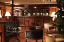 Relaxing in the lounge aboard Jaz Crown Jewel Nile Cruise – cocktails with Nile backdrop