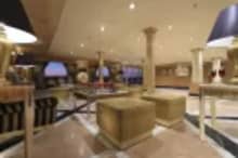 Elegant lounge interior of the Iberotel Crown Emperor Nile Cruise with luxury seating