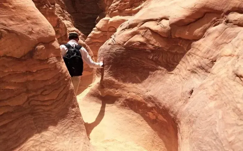 Colored Canyon narrow passage Sinai — dramatic sandstone walls, Sharm el-Sheikh day trip