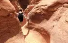 Colored Canyon narrow passage Sinai — dramatic sandstone walls, Sharm el-Sheikh day trip
