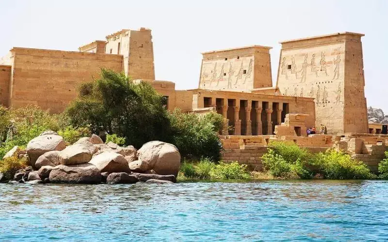 Enjoy the beauty of the Philae Temple and Nile River scenery in Aswan on luxury Egypt and Jordan tours.