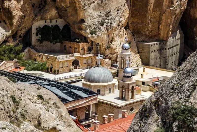 Christian village of Maaloula with stone houses and historic churches nestled in the mountains of Syria.