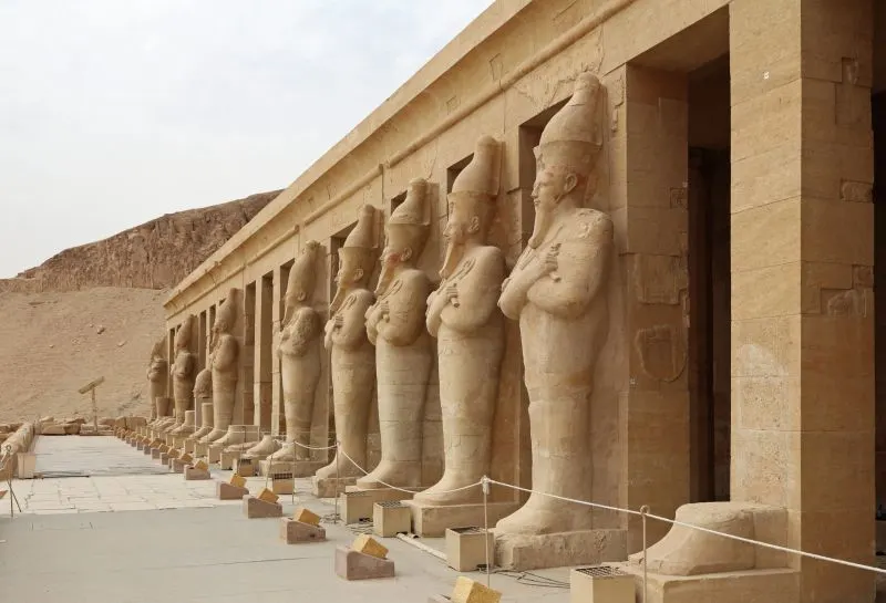 Queen Hatshepsut Temple glowing in soft winter light on Egypt Christmas tour