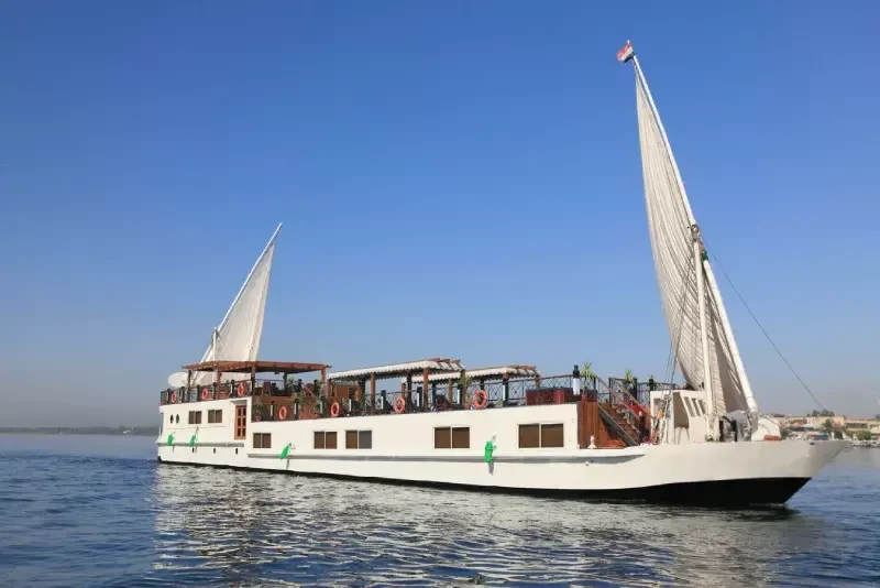 Merit Dahabiya Nile Cruise sailing peacefully between Luxor and Aswan