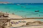 Relaxing on Hurghada beach during 11-day Classic Vacations Travel Egypt