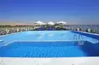 Iberotel Crown Emperor Nile Cruise sun deck with glistening pool on the Nile