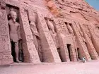 Temple of Ramses II at Abu Simbel with four giant statues carved into the mountain