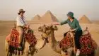 Camel ride at Giza Pyramids with Cairo desert view