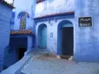 Colorful blue-painted buildings and narrow streets in the charming town of Chefchaouen, Morocco