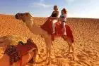 Camel riding experience in the Dubai desert during the 8 Days Egypt and Dubai Package