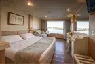 Magic I Nile Cruise elegant bedroom cabin with Nile River view