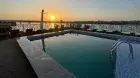 Royal Beau Rivage Cruise pool deck with Nile River scenery