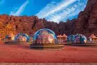 The red desert landscapes and rock formations of Wadi Rum as experienced on the 10 Days Jordan and Egypt Islamic Tour