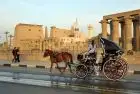 A horse carriage ride adds charm to your Luxor day trip