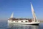Merit Dahabiya Nile Cruise sailing peacefully between Luxor and Aswan