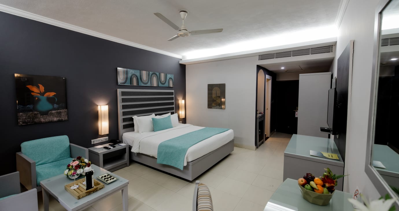 Luxury Pool View Suite with Living Room & Balcony