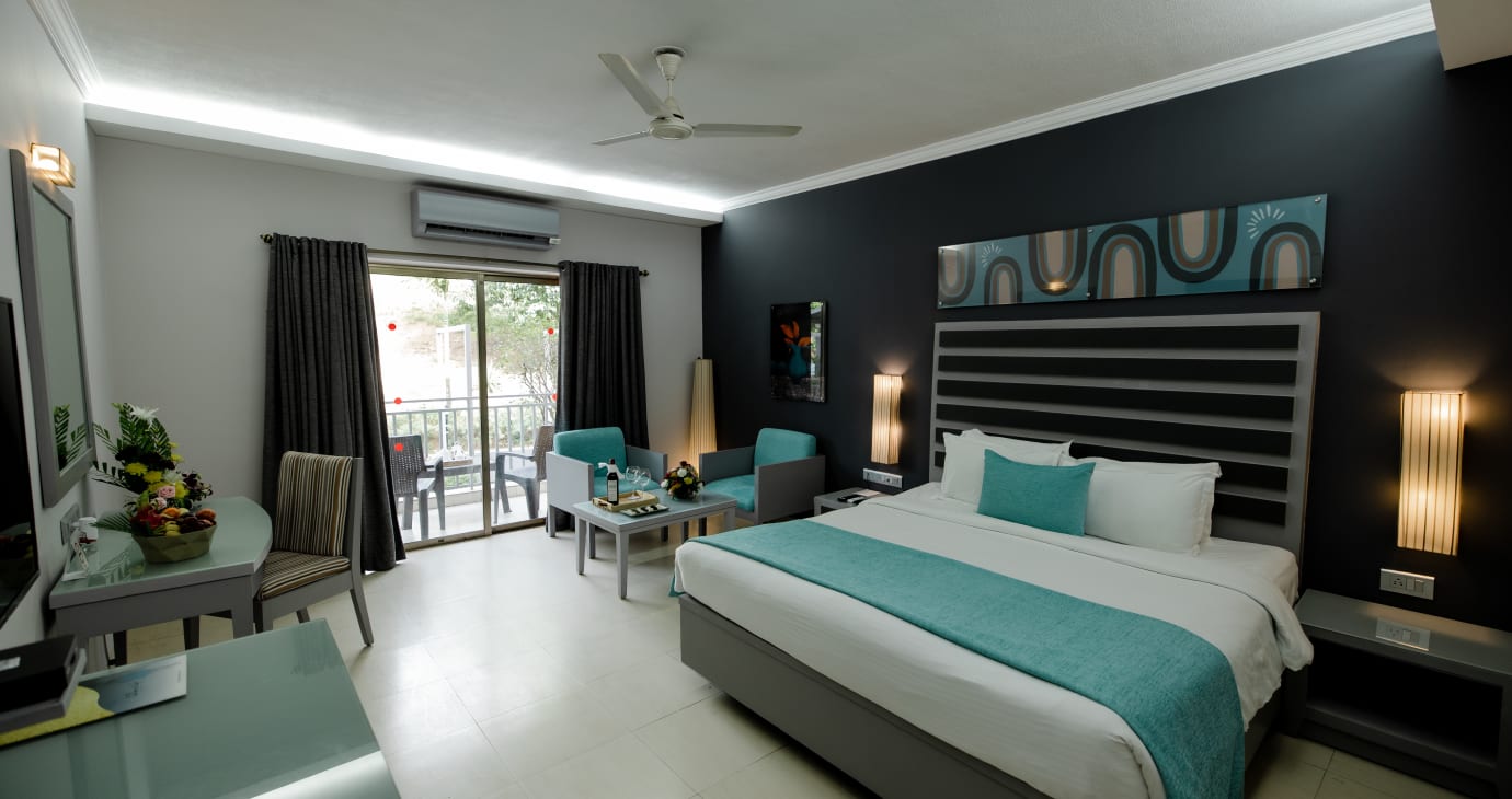 Luxury Pool View Suite with Living Room & Balcony
