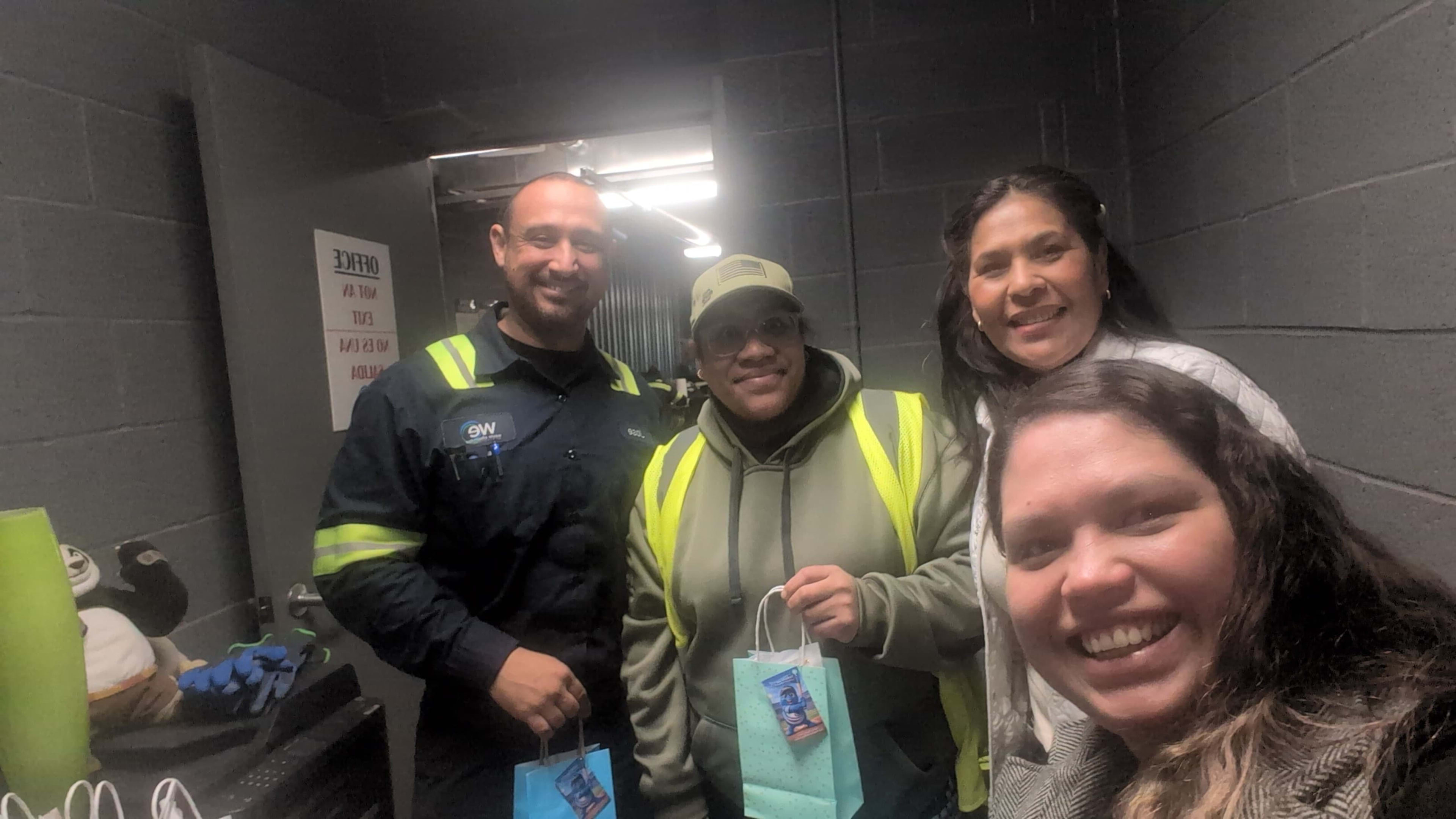 First National Staffing associates embracing at Employee Appreciation Tour celebration