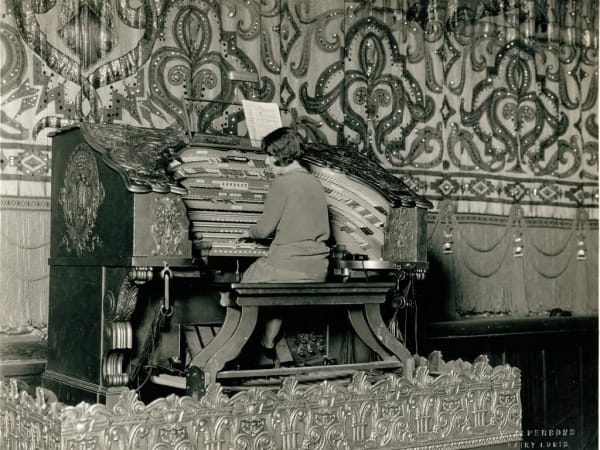 Woman playing the Wurlitzer organ at The Fox Theater