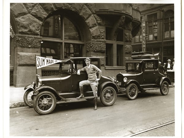 Man and Automobile in Front of Globe-Democrat Building, Sixth Street and Pine Street