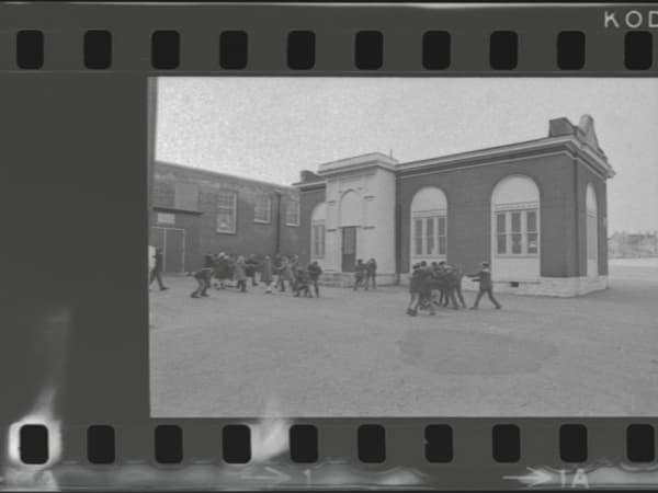 DIVOLL SCHOOL: CHILDREN IN SCHOOL YARD.