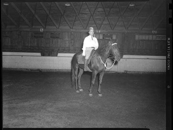 Moolah Mounted Patrol in an Indoor Horse Arena at the Missouri Stables