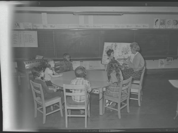 Gallaudet School: Group Around Hearing Aid Table