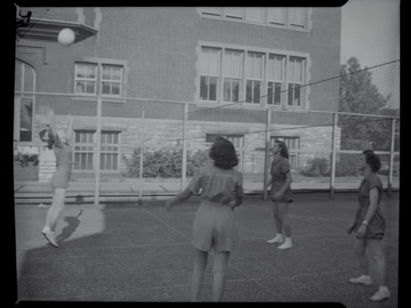 McKinley High School: Four Girls Playing Volleyball