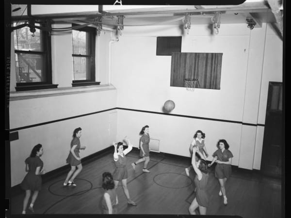 Blewett High School: Girls' Basketball in Gym.