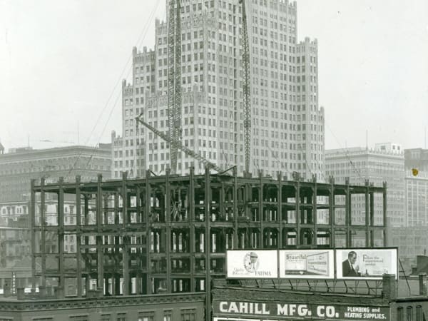 View of the Steel Framework of the Civil Courts Building During Construction Seen From the Southwest. Southwestern Bell Telephone Building in Background.